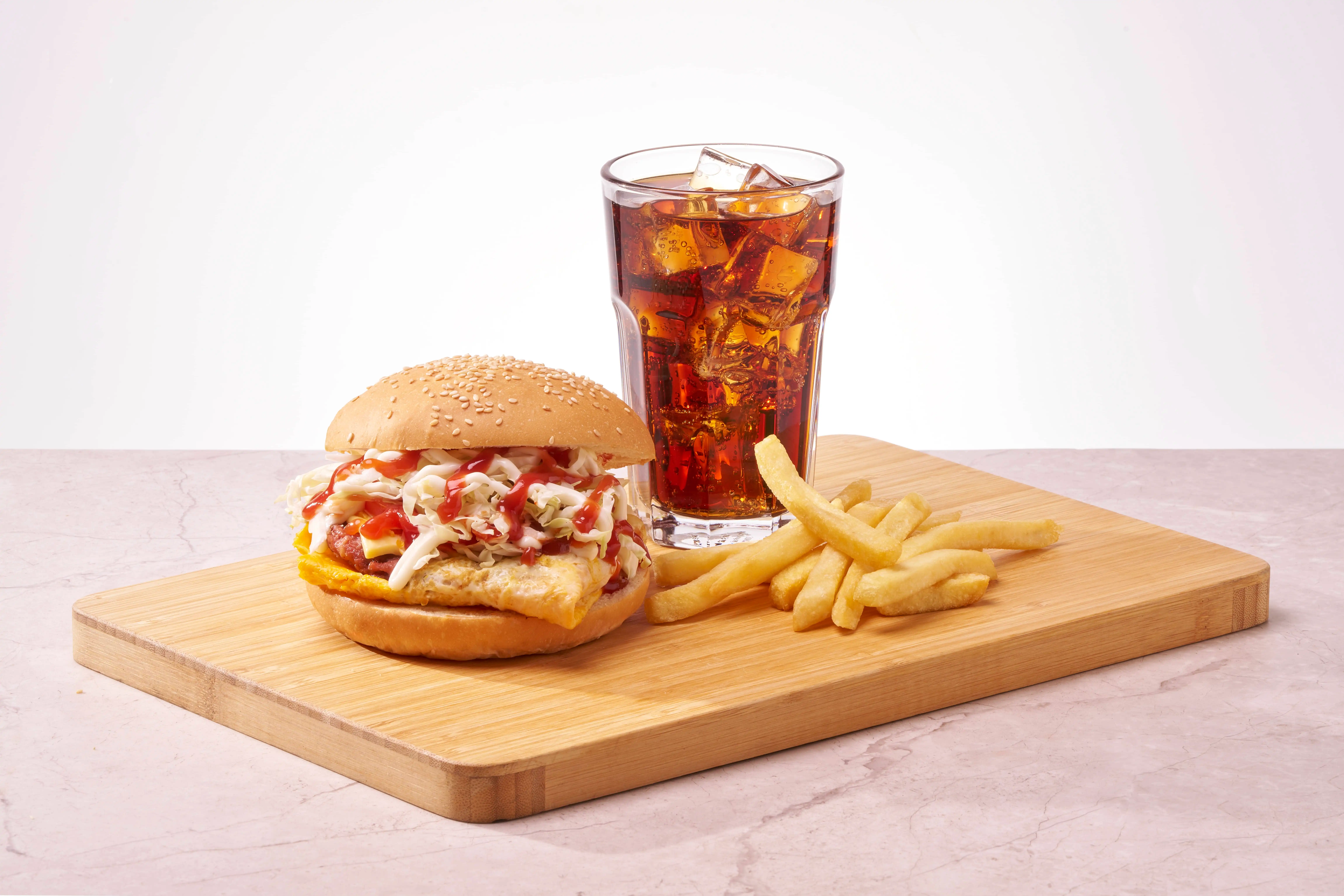 A Stack'd beef burger combo with fries and a drink